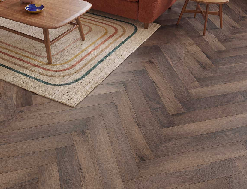 Timeless Honeyed Oak Herringbone Glue Down LVT