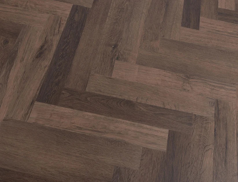 Timeless Honeyed Oak Herringbone Glue Down LVT